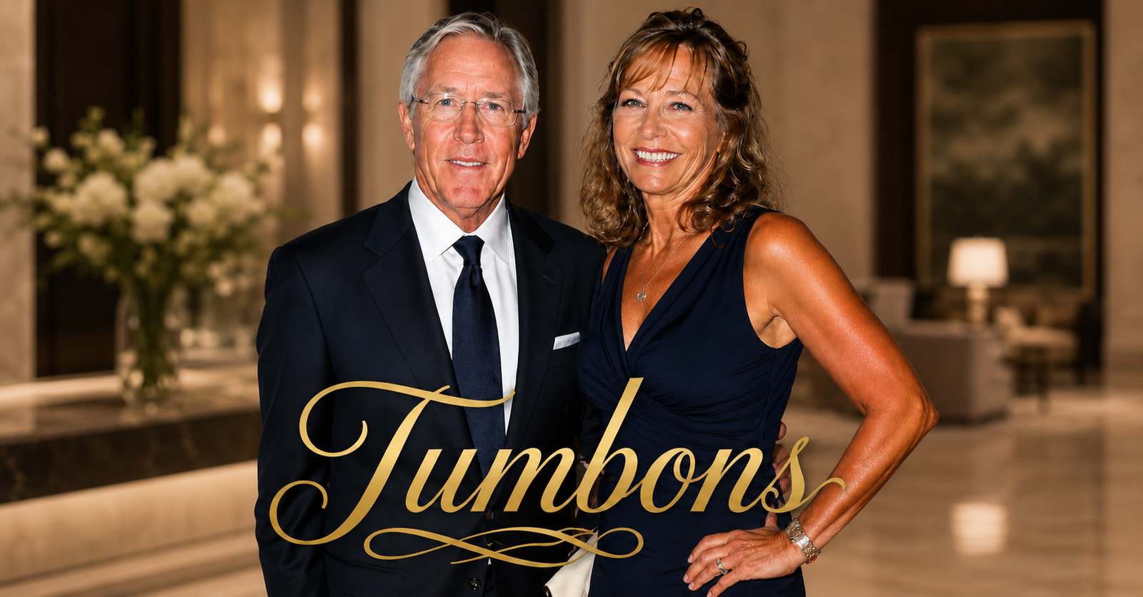 Pete Carroll and his wife standing together at a formal public event